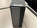 the computer is sitting on top of the desk in the office