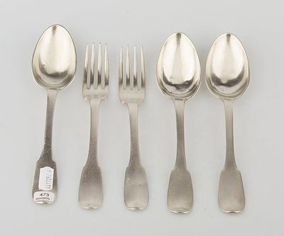 four silver spoons and a fork on a white surface
