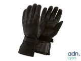 a close up of a pair of black leather gloves on a white background