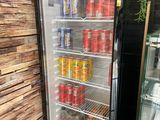 a refrigerator that has a lot of drinks inside of it