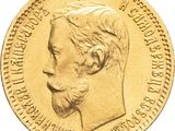 l'image d'une pièce d'or sur laquelle figure le visage d'un homme