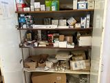 many boxes and boxes on the shelves in the room