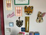 a refrigerator with many magnets on it in the kitchen