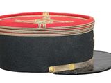 a black hat with a red band and a gold buckle