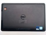 the back of a laptop with a dell logo on the screen