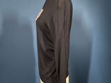 a woman ' s black sweater on a mannequin mannequin mannequin mannequin mannequin mannequin mannequin mannequin