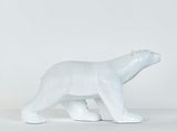 sculpture of a white polar bear on a white surface