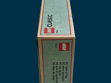 a box of legos sitting on a blue surface