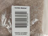 a label that says vero moda on the back of a sweater