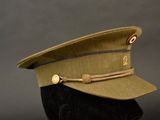 hat on a mannequin head with a black background