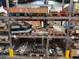a large amount of metal items on the shelves in the warehouse