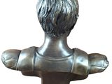 statue of a boy with short hair on a white background