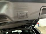 a close up of a car ' s interior with the door open