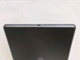 an apple laptop computer sitting on top of a white table