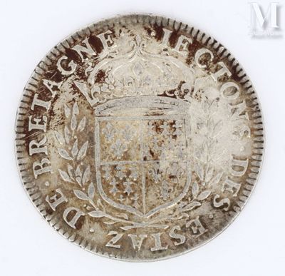 an old silver coin with a crown on top of it