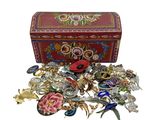 a red box with many different types of jewelry in it