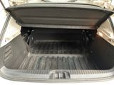 the back of a car with its trunk open showing the cargo compartment