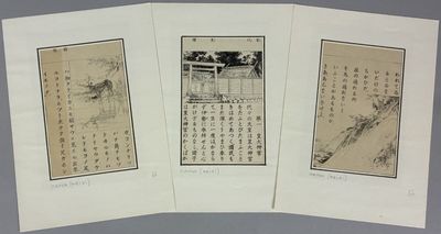 three old chinese calendars with asian writing on them on a table