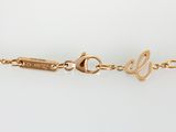 a gold bracelet with the word love written on it