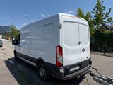 a white van parked on the side of the road