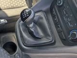 a car dashboard with a steering control and a steering wheel