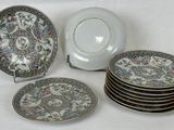 many plates that are sitting on a table