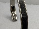 bracelet manchette en argent avec émail noir et incrustations d'argent