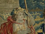a tapestry with a painting of a man and a woman