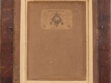 an old picture frame with a drawing of a man on it
