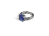an image of a blue sapphire and diamond ring on a white background