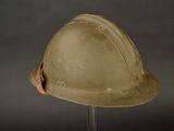 a helmet that is sitting on top of a stand
