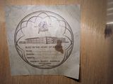 a piece of paper with a drawing of a building on it