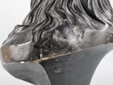 sculpture of a bust of a man with long hair and a beard