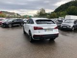 cars are parked in a parking lot in a parking lot