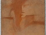 une image représentant une peinture du visage d'une femme sur un morceau de bois
