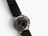 an image of a black watch with roman numerals on a white background