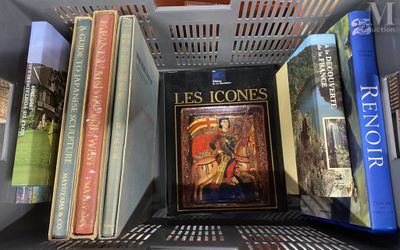 many books that are on a shelf in a book case