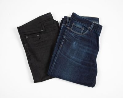 two pairs of jeans on a white background