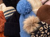 many hats that are sitting on the floor together