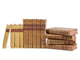 a stack of books sitting on top of each other next to each other
