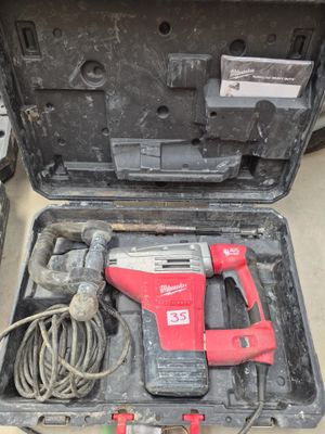 a tool in the case that is sitting on the floor