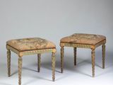 pair of stools with upholstered upholstered seat and foot rest