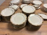 a lot of plates that are sitting on a table