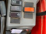 a close up of a car ' s dashboard with a key board on it