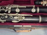 two clarinets in a case on a table