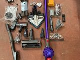 many different types of vacuums and other household items on the floor