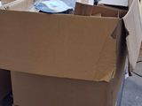 a large box full of boxes sitting on a pallet