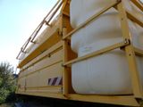 a large container on the back of a truck