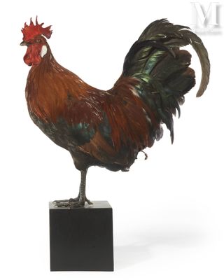 statue of a rooster standing on a black base