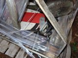 a pile of items sitting on top of a wooden pallet